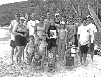 Mattapoisett Beach Families
When the winter has been a little too hard to take, where do residents of Mattapoisett escape? Apparently, to Cinnamon Bay in the U.S. Virgin Islands. During April vacation the Clarke family, the Truesdale family, and the Field/Wilbur clan all found themselves on the same sunny beach ... luckily someone had a copy of The Wanderer handy for this posed group photo.
