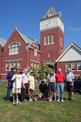 Executive Branches
Members of the Mattapoisett Tree Planting Committee pose with the newly-planted red maple tree donated by Deborah Smiley and her husband, Sam Ogle. The tree they chose to donate was raised from seed taken from a red maple that still grows at the Mansion House Farm at Mount Vernon  the estate home of our first President, George Washington. (Photo by Robert Chiarito).
