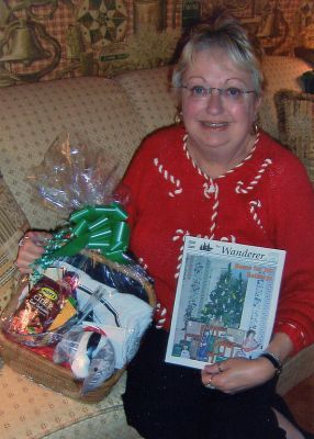 Contest Winner
Claudette J. LeRoux-Bolduc of Rochester poses with a copy of The Wanderer and also a gift basket she won in our I Found the Aardvark monthly contest recently. (1/25/07 issue)
