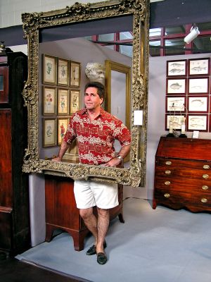 Suitable for Framing
Antique enthusiast Dennis Gouveia poses within an antique frame that is just one example of the many fine items that were on display during the recent Marion Antiques Show at Tabor Academy. The annual show has been dubbed The Little Gem of New England and draws over 70 dealers each year. (Photo courtesy of Frank McNamee).

