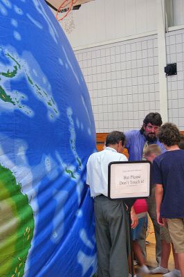 Global Warming
Students at Rochester's Memorial School were given a rare look at a scaled model of Planet Earth during a recent Earth Balloon program sponsored by professors from Bridgewater State College. (Photo by Robert Chiarito).
