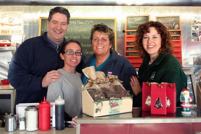 Fox at the Nest
Doug "VB" Goudie of Fox 25 Morning News, waitress Melissa Garcia, Fox 25 producer Carol Lanigan LaMarr, and Nest Diner owner Barbara St. John pose during the recent segment of "Diner Wednesday" broadcast from the Mattapoisett establishment on December 3, 2008. (Photo by Robert Chiarito).
