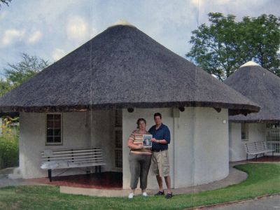 Out of Africa
Frank and Betsey Beatriz of Mattapoisett pose with a copy of The Wanderer outside a South African ronderal, where they stayed in January of 2007 with Betseys parents, Lieutenant Commander Calvin F. Perkins (retired) and Donetta Perkins, also of Mattapoisett.

