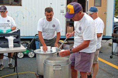Harbor Days 2007
Members of the Mattapoisett Lions Club serve up the always popular chowder during the annual seaside Harbor Days festival in Shipyard Park. Sponsored by the Mattapoisett Lions Club during the weekend of July 20-22, the event drew thousands of people who enjoyed craft booths, great food, amazing entertainment, and some hometown pride. (Photo by Rebecca McCullough).
