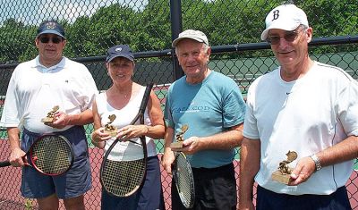 Tops in Tennis
Winners of the Seventh Annual Mattapoisett Community Tennis Association (MCTA) Tournament held on June 30 include (l. to r.) Mike Ailes, Mattapoisett; Sugar Broughton, Wareham; Dave King, East Wareham; and Wayne Miller, Mattapoisett. The MCTA is a non-profit organization for tennis players in the tri-town area and surrounding communities. The goal of the MCTA is to promote area tennis and eventually rebuild three tennis courts at Center School in Mattapoisett.
