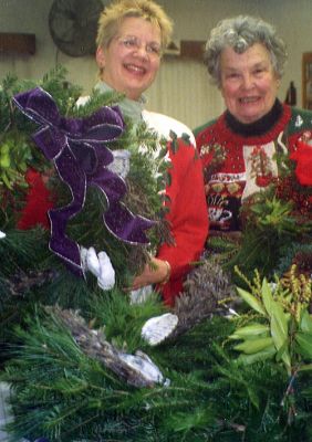 Deck the Halls
Lorinda Callahan and Jane Barker prepare wreaths and other Christmas decorations for the Marion Garden Discussion Groups Christmas Boutique to be held on Saturday, December 10 from 9:30 am to 4:00 pm in the library of Saint Gabriels Church in Marion.
