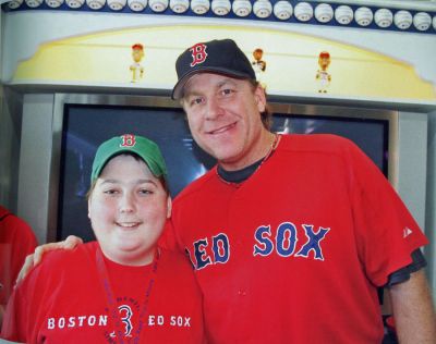 King and Curt
Matthew King of Mattapoisett poses with Boston Red Sox pitcher Curt Shilling during a recent benefit held for the Dana-Farber Cancer Institute. Like the many local friends and family members who have supported Matthew during his illness, Curt Shilling and the Red Sox have been longtime supporters of Dana-Farber and the Jimmy Fund.

