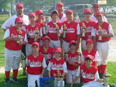 Rochester Baseball Champs
Members of the Rochester Youth Baseball (RYB) 11-12 All Stars are on a roll this summer. They just nabbed their second tournament win in the Rehoboth Summer slam by beating Easton 8-5. Here the teammates pose with their tournament trophies right after the big win. (Photo courtesy of Chris Dessert).
