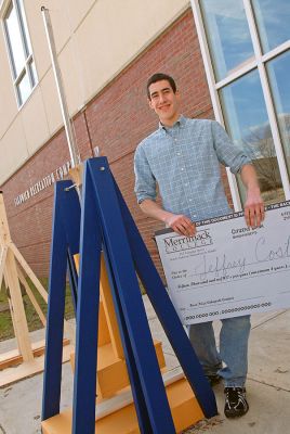 Catapult to College
Jeff Costa, a Rochester resident and senior at Old Rochester Regional High School in Mattapoisett, recently won a $15,000 a year scholarship to study civil engineering at Merrimack College in North Andover, MA. Jeff is standing next to a homemade egg catapult he designed and built which beat out four other entrants at a competition on the Merrimack campus during the first annual ThinkFEST. (Photo courtesy of Neal Hamberg).
