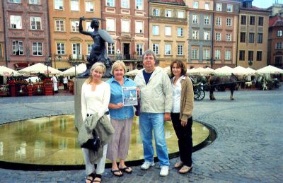 Wanderer in Warsaw
Barbara, Susan, Mary and Attorney Andy Koczera of Mattapoisett pose with a copy of The Wanderer while visiting Old Town, Warsaw, Poland during a trip in September 2006.
