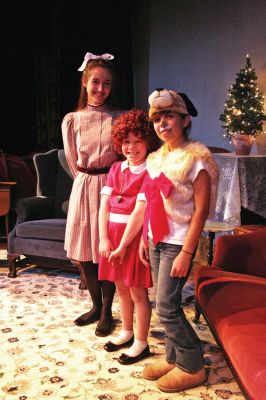 Merry in Marion
(from left) Jackie Scholz, Elizabeth Lonergan and Lucy Schwartz recently performed highlights from various Young Peoples Theater productions at the Marion Art Center as part of the centers Holiday Tea Party event which was held on Saturday, November 29. Guests were encouraged to join in the theme of Annie and Samantha by singing along to songs from the Broadway show and bringing their favorite dressed-up dolls or stuffed animals along with them. (Photo by Robert Chiarito).

