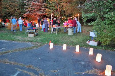 Cozy Campfire
The Mattapoisett Land Trust sponsored a bonfire at the Dunseith Gardens Seahorse property on Saturday, October 18, which included toasting marshmallows and entertainment provided by Luana Josvold. (Photo by Robert Chiarito).
