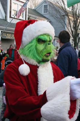 Going Green
Even the Grinch attempted to steal some of Santa's thunder -- and a little Christmas spirit in the process -- during Marion's annual Village Stroll held on Sunday, December 14. (Photo by Robert Chiarito).
