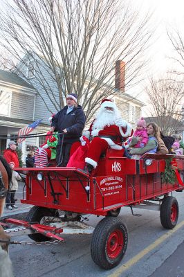 Santa's Buggy
Jolly Saint Nick takes a horse and buggy ride through Marion center with some of his eager fans during the annual Village Stroll held on Sunday, December 14. (Photo by Robert Chiarito).
