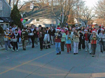 Marion Holiday Village Stroll 2006
Members of the Sippican School Band lead residents along the route of the 2006 Annual Holiday Village Stroll which included appearances from Santa Claus, Frosty the Snowman, Rudolph the Red-Nosed Reindeer, and Sparky the Fire Dog. (Photo by Robert Chiarito).
