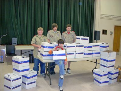 Scouts Honor
Members of Mattapoisett Boy Scout Troop 53 prepare care packages that are going to soldiers in Iraq and Afghanistan over the holidays. Donations are still being accepted to support our soldiers overseas. There is a local collection point at Mailbox Services on Route 6 in Mattapoisett. For more information about what things are needed for care packages, please check out the website of Cape Cod Cares For Our Troops at www.capecod4thetroops.com, or contact Troop 53 Scoutmaster Ron Ellis at 508-758-3311.

