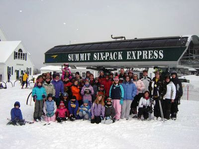 Church Ski Trip
On Saturday, March 1, 2008, a Motor Coach filled with members and friends of the Mattapoisett Congregational Church spent a spectacular day of skiing at Ragged Mountain in Danbury, NH. A most recent copy of The Wanderer is being held in the picture. (Photo courtesy of Rick Vigeant). (03/06/08 issue)
