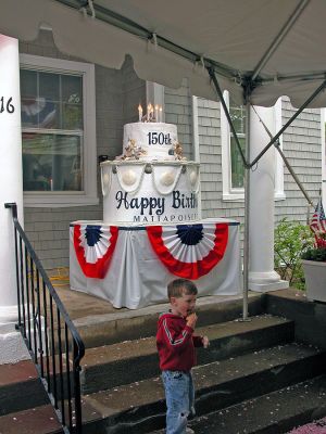 Mattapoisett Birthday Bash
A party-goer has his cake ... and eats it, too ... during Mattapoisett's 150th Birthday Celebration on Sunday, May 20, 2007. (Photo by Robert Chiarito).
