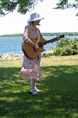 Arts in the Park
Mattapoisett Library Director and musician Judy Wallace performed during the recent "Arts in the Park" benefit to raise money for furnishings in the new Mattapoisett Public Library which was held on Sunday, June 24 in Shipyard Park in Mattapoisett. (Photo by Robert Chiarito).

