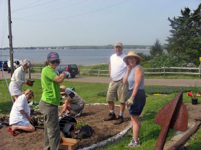 Logo Planting
On Saturday, May 26, members of the town's 150th Birthday Garden Club planted a special 150th birthday garden at the Town Wharf.  The garden that they created is a planted recreation of the logo for the town's birthday. (Photo by Danny White).
