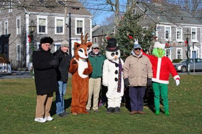 Grinch Greetings
Mattapoisett's annual "Holiday in the Park" celebration was held in Shipyard Park on Saturday, December 1, 2007 and drew a record crowd to the seasonal seaside event. Here the town's Board of Selectmen pose with a few friends including (l. to r.) Town Administrator Mike Botelho, Selectman Jordan Collyer, Rudolph the Red-Nosed Reindeer, Selectman Ray Andrews, Frosty the Snowman, Selectman Steve Lombard, and the Grinch. (Photo by Robert Chiarito).
