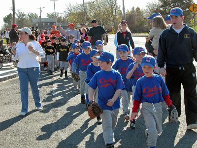 Mattapoisett Opening Day 2007
Opening Day Ceremonies for the 2007 season of Mattapoisett Youth Baseball (MYB) included special guests and local legends such as former American Idol contestant Ayla Brown, who sang the National Anthem and threw out the ceremonial first pitch, and former Boston Red Sox pitcher Brian Rose. The day also included a tribute to longtime MYB supporter and former Mattapoisett Recreation Director John Haley with the field at Old Hammondtown School in his honor. (Photo by Robert Chiarito).
