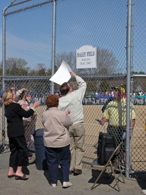 Mattapoisett Opening Day 2007
Opening Day Ceremonies for the 2007 season of Mattapoisett Youth Baseball (MYB) included special guests and local legends such as former American Idol contestant Ayla Brown, who sang the National Anthem and threw out the ceremonial first pitch, and former Boston Red Sox pitcher Brian Rose. The day also included a tribute to longtime MYB supporter and former Mattapoisett Recreation Director John Haley with the field at Old Hammondtown School in his honor. (Photo by Robert Chiarito).
