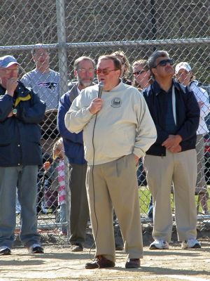 Mattapoisett Opening Day 2007
Opening Day Ceremonies for the 2007 season of Mattapoisett Youth Baseball (MYB) included special guests and local legends such as former American Idol contestant Ayla Brown, who sang the National Anthem and threw out the ceremonial first pitch, and former Boston Red Sox pitcher Brian Rose. The day also included a tribute to longtime MYB supporter and former Mattapoisett Recreation Director John Haley (pictured) with the field at Old Hammondtown School in his honor. (Photo by Robert Chiarito).
