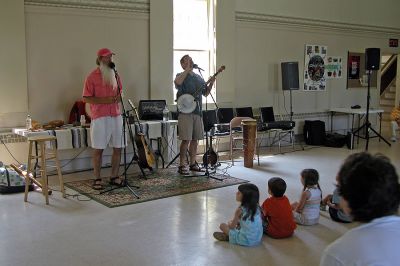 Stories and Songs
As part of the Mattapoisett Public Library's summer reading program, Davis Bates and Roger Tincknell presented a live performance called a "Multi-Cultural Celebration in Story and Song" in Reynard Hall of the Mattapoisett Congregational Church on Monday, June 25 which had kids singing and dancing to a variety of songs and stories. (Photo by Kenneth J. Souza).
