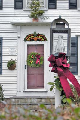 Mattapoisett Door Contest 2006
Winners of Mattapoisetts First Annual Holiday Village Door Decorating Contest, sponsored by the Mattapoisett Womans Club, were selected on Monday, December 11. Pat Walters, 31 Water Street won the Colonial Award for this doorway. (Photo by Kenneth J. Souza).
