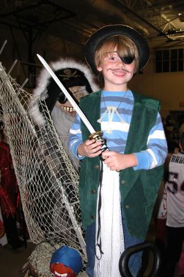 Mattapoisett Halloween '06
Freemin Bauer nabbed the first prize in the Grade 1 and 2 category in Mattapoisetts Annual Halloween Parade for his pirate costume, replete with moving pirate ship. (Photo by Kenneth J. Souza).

