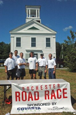 Rochester Road Race
Mike Norton of East Falmouth (center) accepts his award from Rochester Road Race Committee members (l. to r.) Travis Van Hall, Jeff Perry, Scott Muller, Kevin Cassidy, and Chuck Kantner. Mr. Norton was the overall winner of the first annual event with an impressive 16:39 finish time. (Photo by Angela Kantner).
