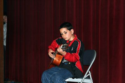 Talent to Spare
Old Hammondtown School student Nick Kondracki plays "Optimist" on the acoustic guitar during the school's Talent Show held on Tuesday, April 29 in Mattapoisett. (Photo by Kenneth J. Souza).

