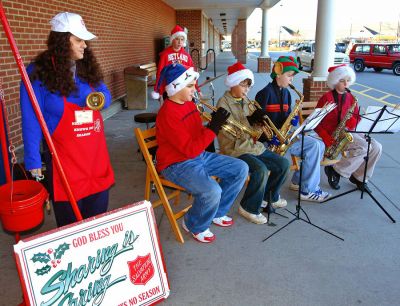 ORR Army Band
Seventh grade musicians from ORR Junior High School including Jack Thomas, Tom Tucker, Ian McLean, and Teddy Kassabian with Seamus McMahon on percussion recently accompanied Salvation Army bell ringer Lucy Genereux of New Bedford at the Stop and Shop in Fairhaven as part of a community service project.
