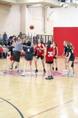 March Madness
Old Rochester Regional Junior High School hosted March Madness Junior, a benefit basketball game on Friday evening, March 14, which pitted the students and faculty against each another. The game, which was organized to benefit the Thuestad family of Mattapoisett and the DeMello family of Rochester, ended with the students narrowly defeating the faculty, 48-47. (Photo by Robert Chiarito).
