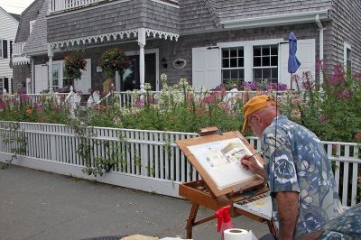 Paint the Town
Artist Lee Jones works on a watercolor rendering of the Mattapoisett Inn on Water Street during the fifth annual "Fresh Paint" event held on Tuesday, July 17 to benefit the Mattapoisett Public Library. (Photo by Kenneth J. Souza).
