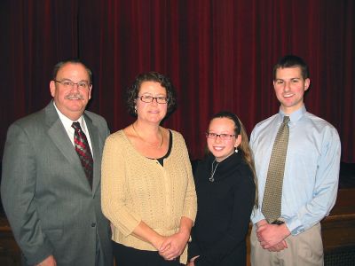 Welcome to Marion
Marions new Town Administrator Paul Dawson (far left) poses with (l. to r.) his wife Joy, daughter Allie, and son Matt, during a special meet and greet evening held at the Marion Music Hall on Tuesday, January 30. Mr. Dawson has only been on the job a couple of weeks now, but he has already gotten to know many of the towns residents and is looking forward to working in Marion. (Photo by Nancy MacKenzie).
