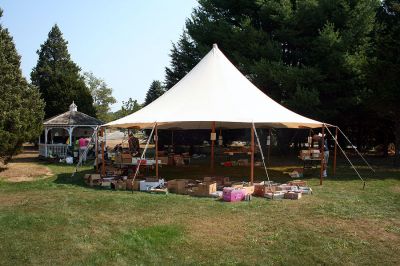 Book Bargains
Book lovers had a chance to find a good read or two as the Friends of the Joseph Plumb Memorial Library in Rochester held their annual book sale under a tent on the librarys lawn on Saturday, September 8. Bargain hunters have been flocking to this event for years in search of the perfect book and this sale was no exception with shoppers arriving bright and early to get the first crack at box upon box of reading pleasures all priced at $2 or less. (Photo by Robert Chiarito).
