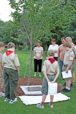 Seeds of Liberty
Members of Rochester Boy Scout Troop 31 who participated in the recent dedication of a newly-planted Liberty Elm tree on the front lawn of the Plumb Memorial Library in Rochester included (from left) Sam York, Scoutmaster Mr. Bernier, Jeremy Stubbs, Chris Bernier, and Chad Underhill. The troop presented a framed version of Thomas Paines poem Liberty Tree to Rochester Selectman Richard Nunes to be hung within Town Hall. (Photo by Kenneth J. Souza).

