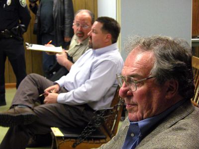 Rural Recount
Former Selectman Gary Laboa (background) consults with Attorney Rick Manning during the election recount while reconfirmed winner Dan McGaffey waits for the results. (Photo by Kenneth J. Souza).
