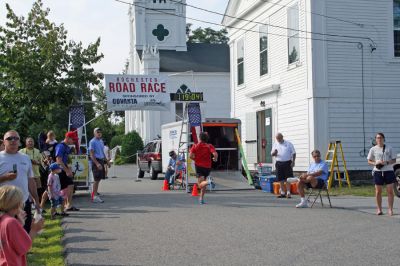 Rochester 5K
Runners cross the finish line in the 2008 Rochester Road Race 5K held on Saturday, August 16. (Photo by Olivia Mello).

