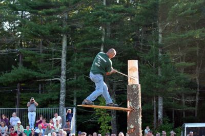 Wood, If I Could
The ever-popular Woodsman Show remains a highlight of Rochesters annual Country Fair and was held on Friday evening, August 22. Here a contestant displays his skills at the difficult and sometimes dangerous axe-throwing competition. Other events included log rolling, bow sawing, disc stacking, spring board chop, two-person cross cut, chainsaw cutting, and downward chop. Some of the woodmen came from as far away as Vermont to compete in this years program. (Photo by Robert Chiarito).
