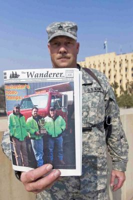 Press Overseas
Marion resident SSG Robert Hickey poses with a copy of The Wanderer at Camp Victory in Baghdad, Iraq. SSG Hickey is a soldier with the 65th PAOC (Press Group) out of Lexington, MA and has been in Iraq since last August. (Photo courtesy of Joanne Hickey).
