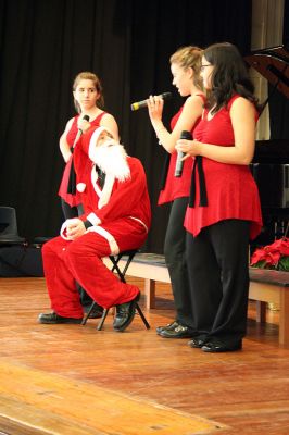Seasonal Singing
Local favorites The Showstoppers performed Christmas classics during their Holiday Concert on Sunday, December 23 at the Marion Music Hall. (Photo by Robert Chiarito).
