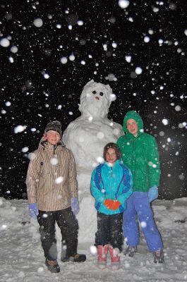 Frosty and Friends
(from left) Alex, Margo and Josephine Cannell of Mattapoisett pose with the giant snowman they made on the Town Wharf during the first significant snowstorm of the season on Friday, December 19. The heavy, wet snow made for ideal packing and was perfect to fashion into a snowman. (Photo courtesy of Joanella Cannell).

