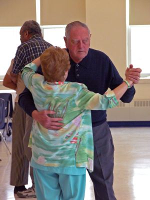 Tri-Town Spring Fling
Seniors from Mattapoisett, Marion and Rochester participated in the eighth annual Spring Fling dance party on Sunday, May 6 in the Sippican School cafeteria. The event was hosted by the Marion Council on Aging (COA) with a group of student volunteers from Old Rochester Regional Junior High School, who not only helped serve refreshments, but also joined their elders on the dance floor for some contemporary and traditional dances. (Photo by Robert Chiarito).
