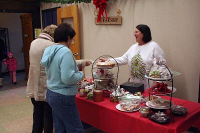 Christmas Fair
Volunteer Pat Aleks sells a variety of baked goods at the annual Christmas Fair held at St. Anthony's Church in Mattapoisett on Saturday, December 6, 2008. (Photo by Robert Chiarito).
