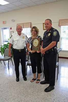 Dispatcher Honored
Rochester Chief Dispatcher Tracy Eldridge received the Thirteenth Annual Jeff Grossman 9-1-1 Telecommunicator of the Year Award on June 29 and is seen here flanked by Ned Merrick, Chief of the Plainville Police Department and a longtime colleague of Mr. Grossman, and Rochester Police Chief Paul Magee. (Photo by Robert Chiarito).

