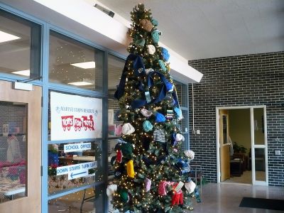 UCT Mitten Tree
The traditional Mitten Tree now on display in the foyer of Upper Cape Cod Regional Technical High School is a project sponsored by UCTs Student Council. The tree is a way of collecting warm clothing such as hats, scarves and mittens to be distributed to needy children throughout the area for the holidays. The 12-foot tree was donated by UCT student Miranda Collins.

