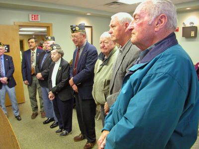 Longtime Legionnaires
Maurice and Donald Linhares (right foreground) listen as the Mattapoisett Board of Selectmen and members of the Florence Eastman Post 280 American Legion presented them recently with citations for 50 years of continuous membership with the local Legion. (Photo by Kenneth J. Souza).
